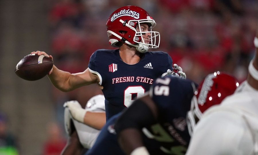 Sep 24, 2021; Fresno, California, USA; Fresno State Bulldogs quarterback Jake Haener (9) throws a pass against the UNLV Rebels in the second quarter at Bulldog Stadium. Mandatory Credit: Cary Edmondson-USA TODAY Sports