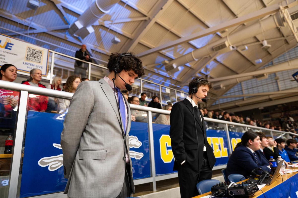 Charlie Dein (left) and Connell McDonough (right) call the Zionsville vs Fishers Girls Basketball Sectional Game.